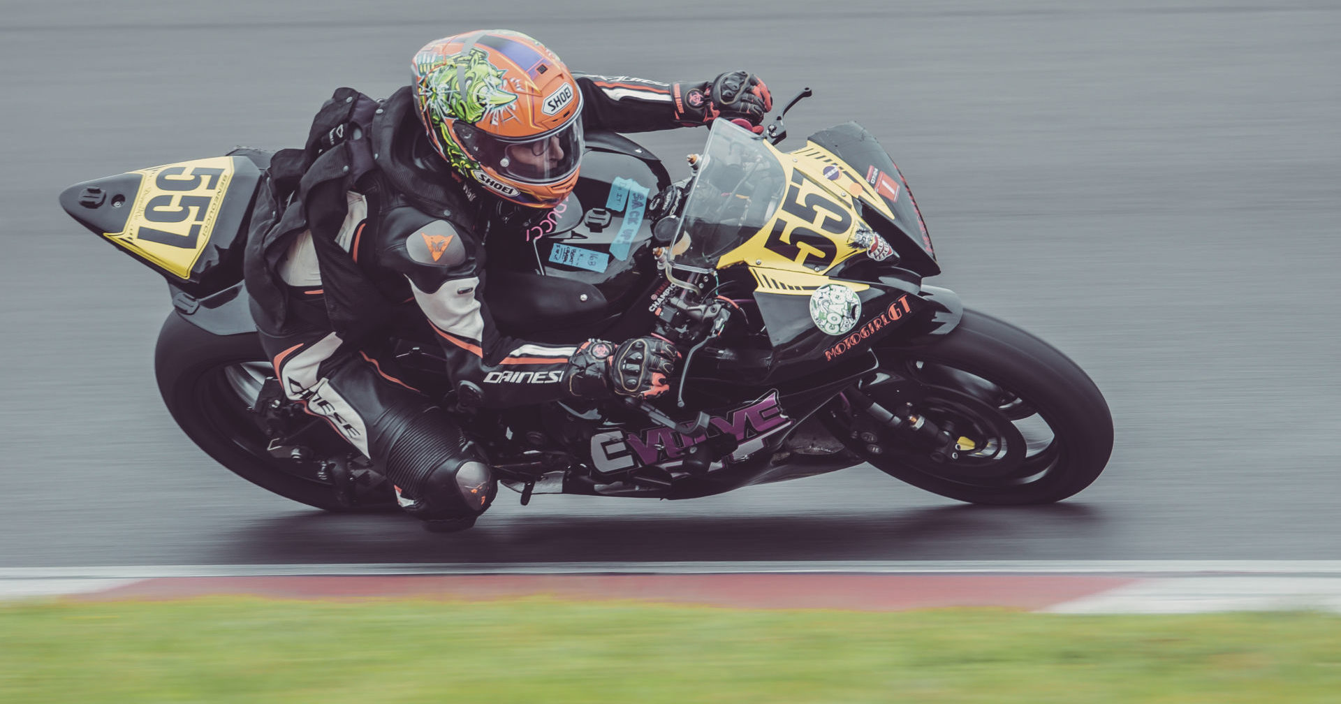 Michele Beneducci (557) at speed at Summit Point Motorsports Park. Photo by Vae Vang/Noiseless Productions, courtesy MotoGirlGT.