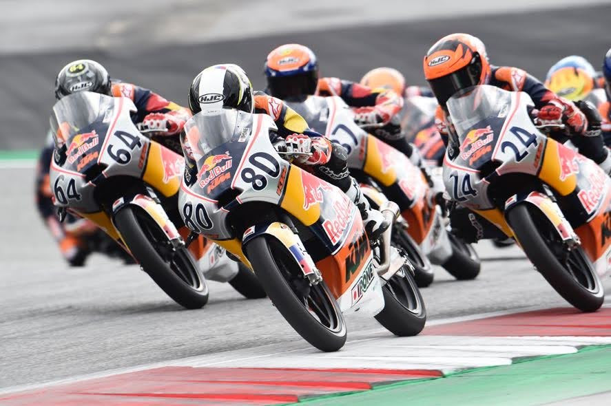 David Muñoz (64), David Alonso (80), and Iván Ortolá (24) during Red Bull MotoGP Rookies Cup Race Two. Photo courtesy Red Bull.