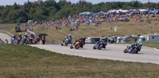 Cameron Beaubier (1) leads Jake Gagne (32), Mathew Scholtz (11), Toni Elias (24) and the rest of the field at the start of MotoAmerica HONOS Superbike Race Two at PittRace. Photo by Brian J. Nelson, courtesy MotoAmerica.