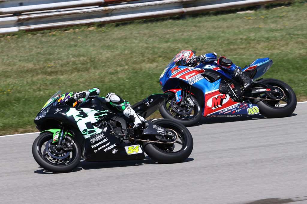 Richie Esclanate (54) and Sean Dylan Kelly (40) battle for the lead in Supersport Race Two. Photo by Brian J. Nelson, courtesy MotoAmerica.