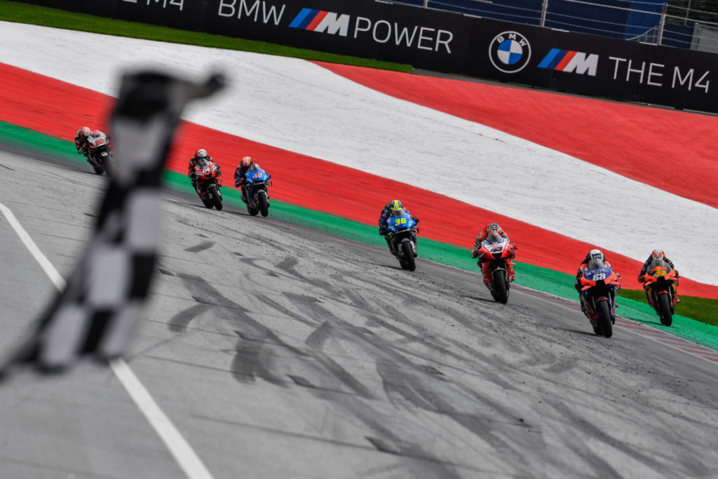 Miguel Oliveira (88). leads Pol Espargaro (44), Jack Miller (43), Joan Mir (36), Alex Rins (42), Andrea Dovizioso (04), and Takaaki Nakagami (30) across the finish line at the Red Bull Ring. Photo courtesy Dorna.