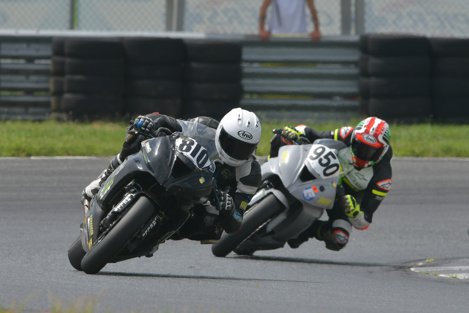 Jeremy Brinker (810) and Jeff Schoff (950) fight for the lead in the Motogladiator Superbike 1000cc race at NJMP. Photo by The SB Image, courtesy of Motogladiator.