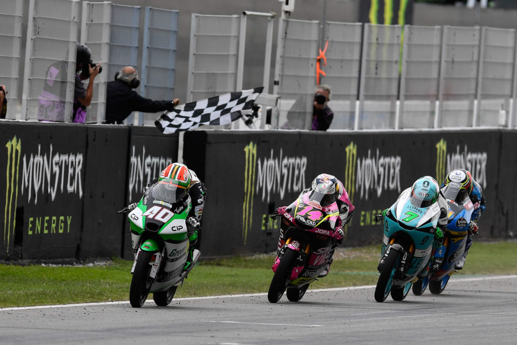 Darryn Binder (40) leads Tony Arbolino (14), Dennis Foggia (7), and Sergio Garcia (11) across the finish line. Photo courtesy Dorna.