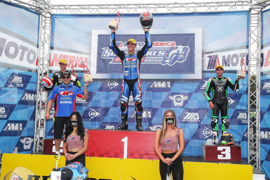 The Sunday MotoAmerica Supersport podium, winner Sean Dylan Kelly flanked by second-place Brandon Paasch (left) and third-place Richie Escalante (right). Photo by Brian J. Nelson.