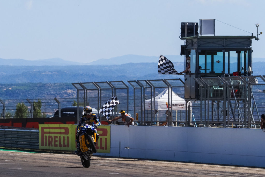 Andrea Locatelli (55) celebrates as he takes victory in Supersport Race One. Photo courtesy Dorna.