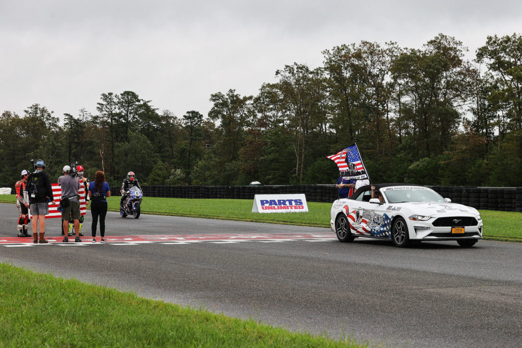 BARTCON Racing paraded a patriotic Mustang on a lap as part of the 9/11 memorial held on Friday. Photo by Brian J. Nelson.