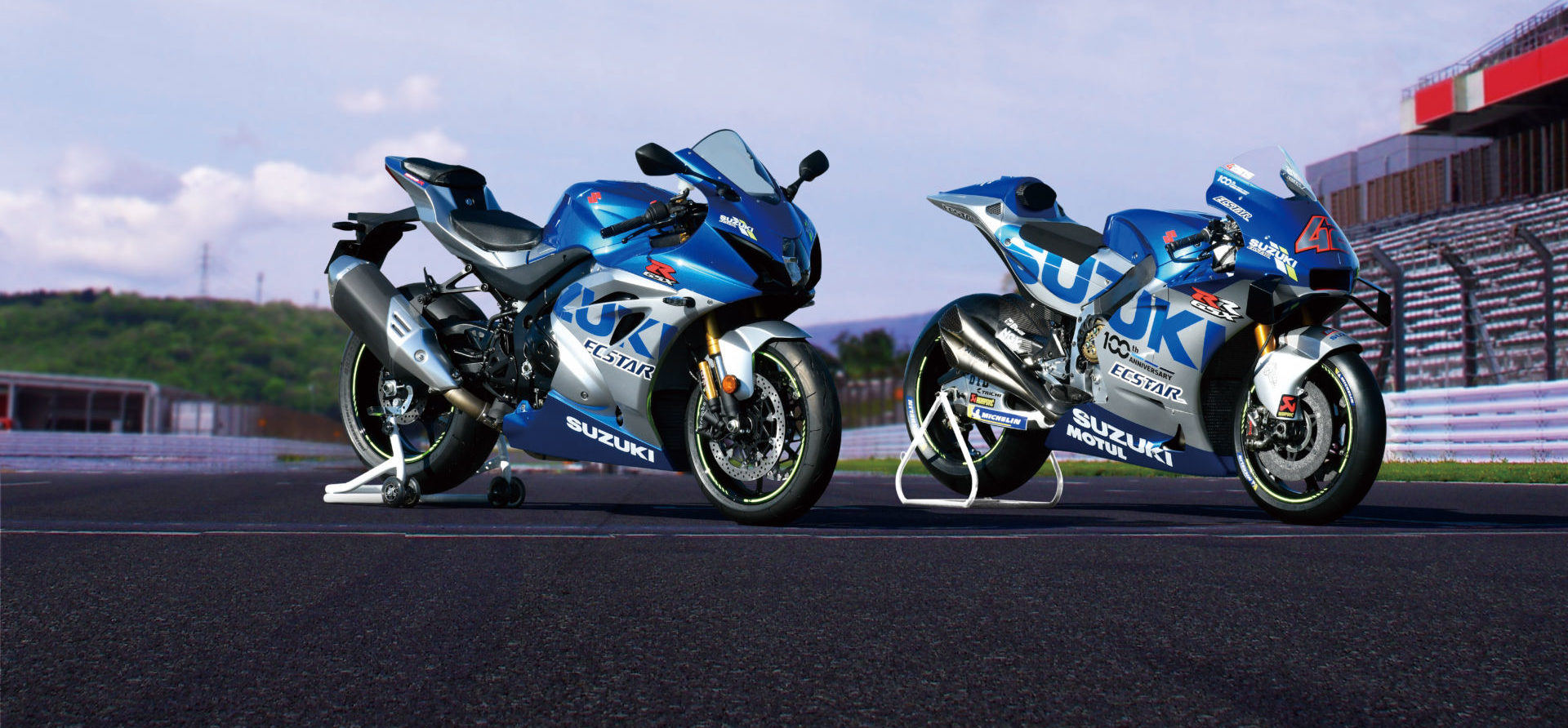 A limited-edition 100th Anniversary Suzuki GSX-R1000R (left) with Alex Rins’ Suzuki GSX-RR MotoGP racebike. Photo courtesy Suzuki.