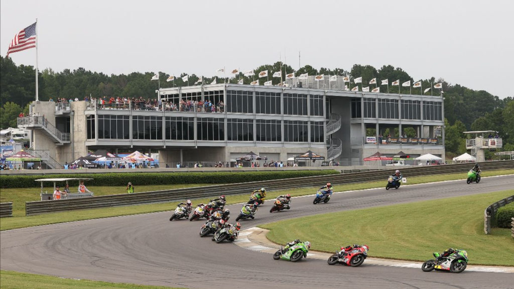 Rocco Landers (1) leading the field through Turn Five at the start of Junior Cup Race One. Photo by Brian J. Nelson.