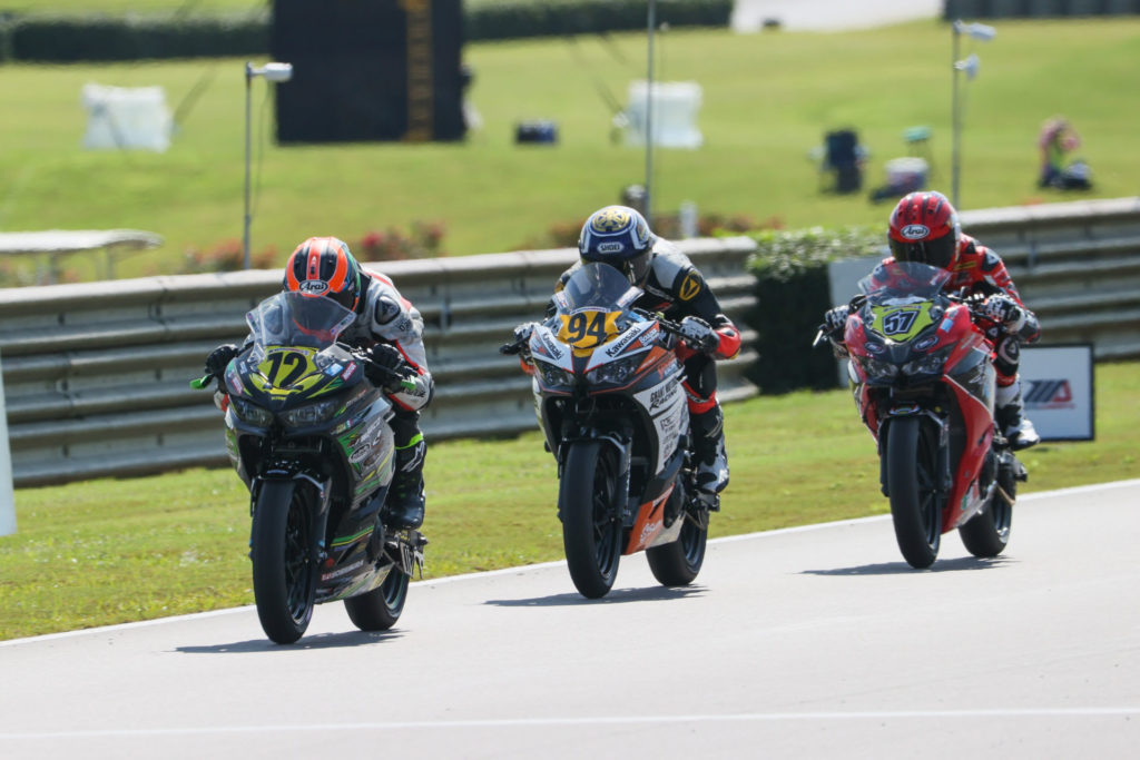 Ben Gloddy (72) leading Liam Grant (94) and Sam Lochoff (57) at Barber Motorsports Park. Photo by Brian J. Nelson, courtesy Quarterley Racing On Track Development.