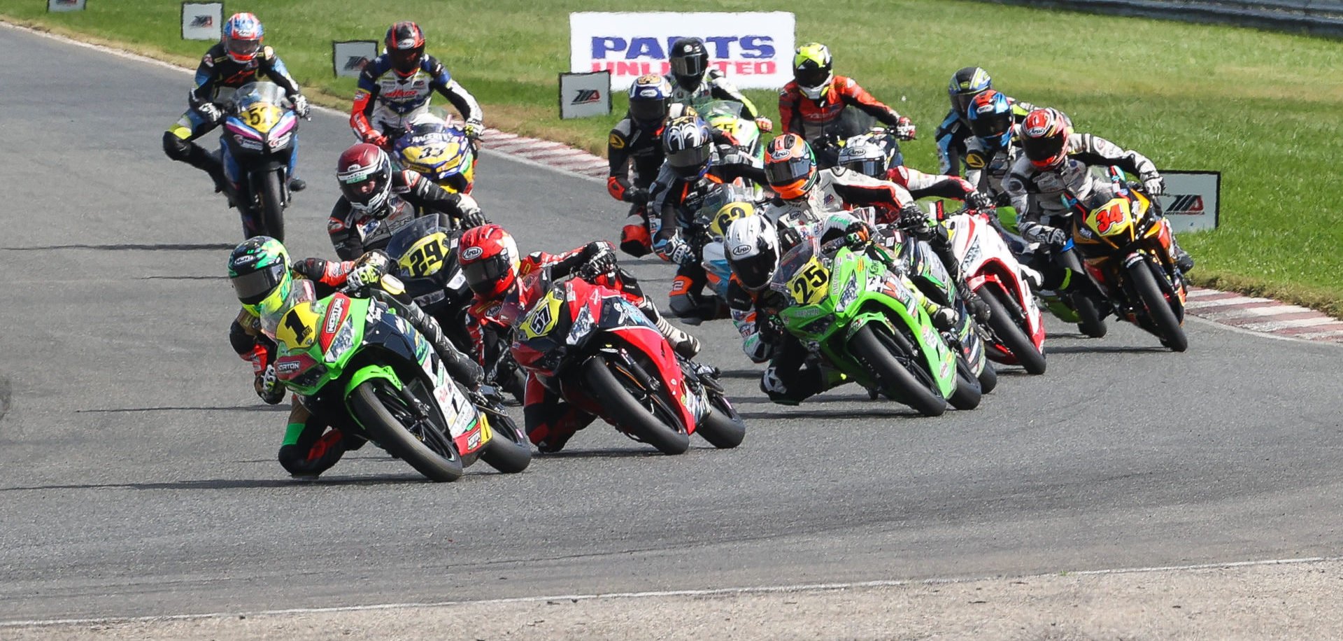 Rocco Landers (1) leads the field into Turn One at the start of Junior Cup Race One. Photo by Brian J. Nelson, courtesy MotoAmerica.