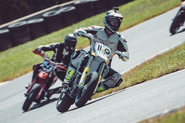 Matt Yarnell (11) and Matt Lamb (5) race for the lead in the Supermoto race. Photo by Vae Vang/Noiseless Productions, courtesy Motogladiator.