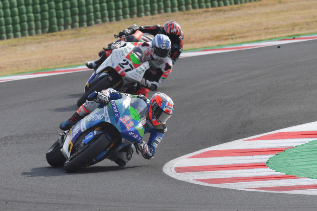 Matteo Ferrari (11) leads MotoE Race Two at Misano II. Photo courtesy Dorna.