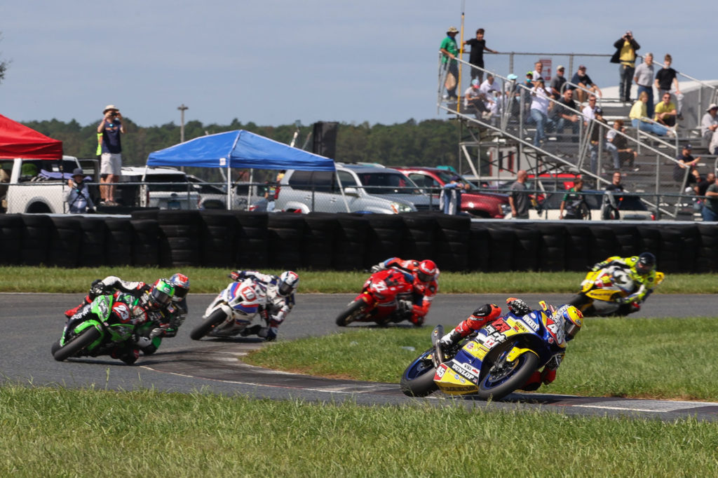 Cameron Petersen (45) leads Corey Alexander (23), Michael Gilbert, Travis Wyman (10), Ashton Yates, and Danilo Lewis (94) at the start of the Stock 1000 race. Photo by Brian J. Nelson, courtesy MotoAmerica.