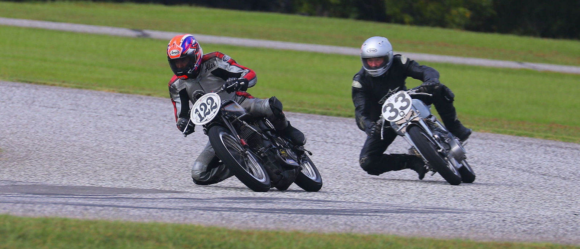 AHRMA racers Alex McLean (122) and David Tompkins (33Q) in action. Photo by etechphoto.com, courtesy AHRMA.