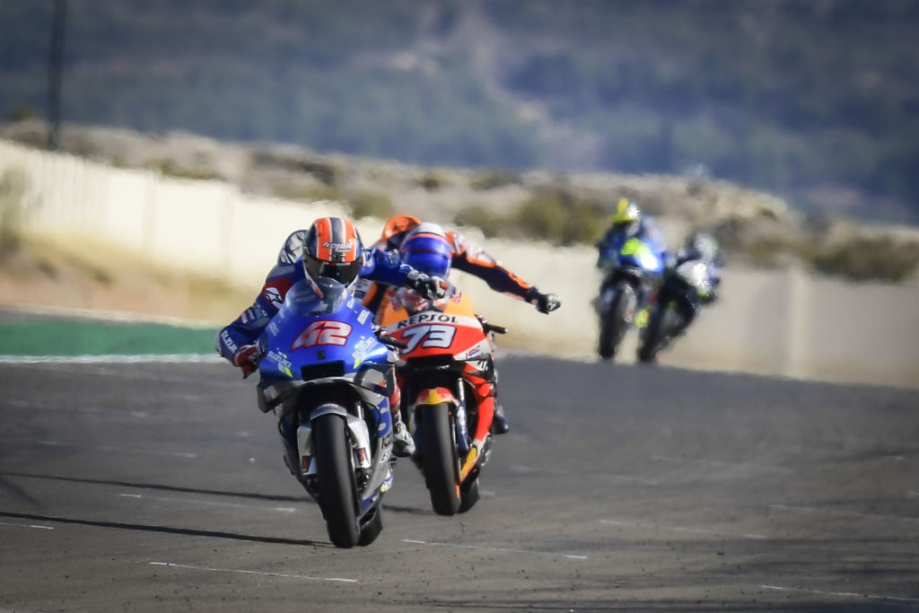 Alex Rins (42) held off Alex Marquez (73) to win the MotoGP race at Motorland Aragon I. Photo courtesy Dorna.