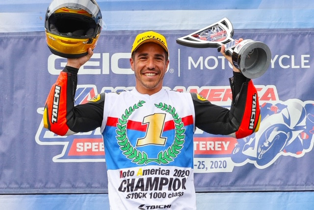 Cameron Petersen on the podium at Laguna Seca. Photo by Brian J. Nelson, courtesy Altus Motorsports.