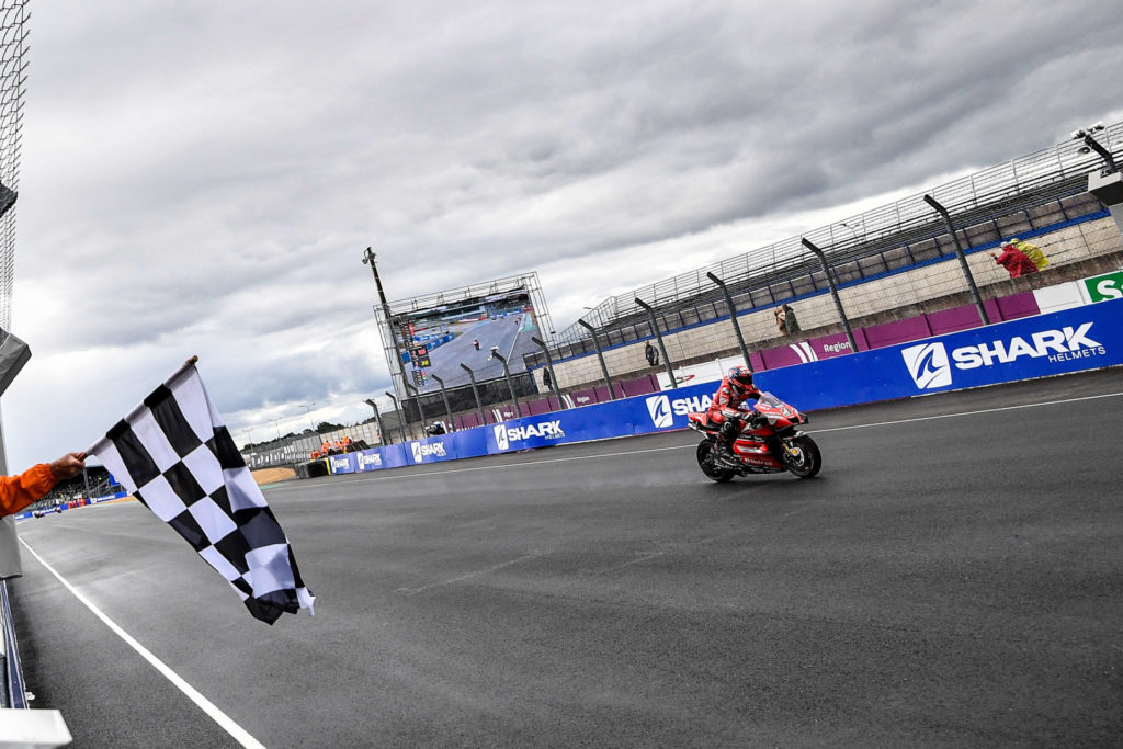 Danilo Petrucci (9) taking the checkered flag at Le Mans. Photo courtesy Dorna.