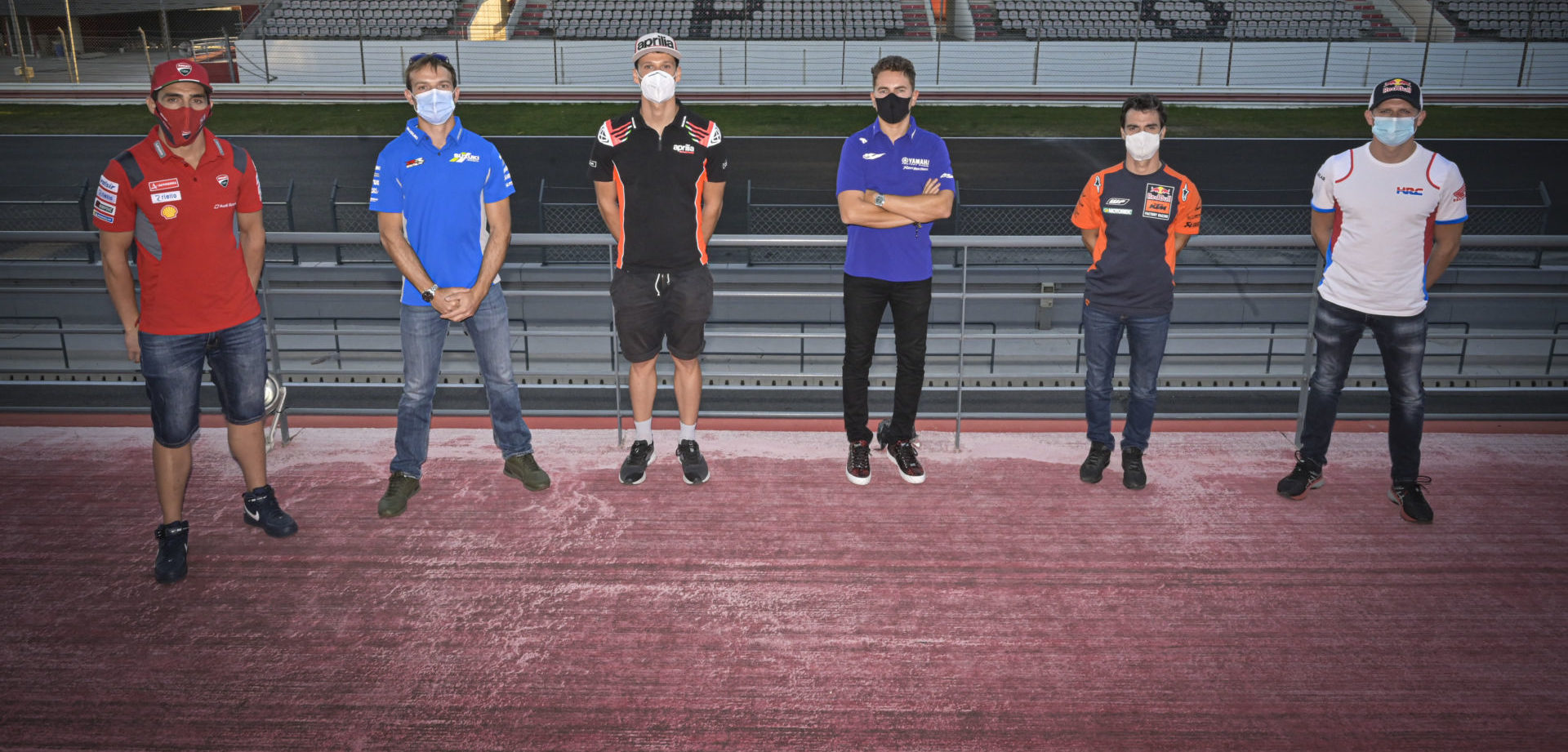 MotoGP test riders (from left) Michele Pirro (Ducati), Sylvain Guintoli (Suzuki), Lorenzo Savadori (Aprilia), Jorge Lorenzo (Yamaha), Dani Pedrosa (KTM), and Stefan Bradl (Honda) at Autodromo Internacional do Algarve, in Portimao, Portugal. Photo courtesy Dorna.