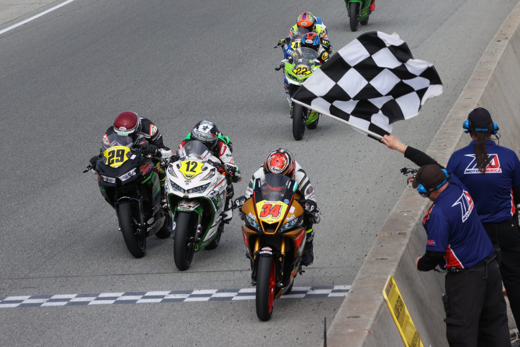 Cody Wyman (34) races Jack Roach (12) and David Kohlstaedt (29) to the finish line at Laguna Seca. Photo by Brian J. Nelson, courtesy Westby Racing.