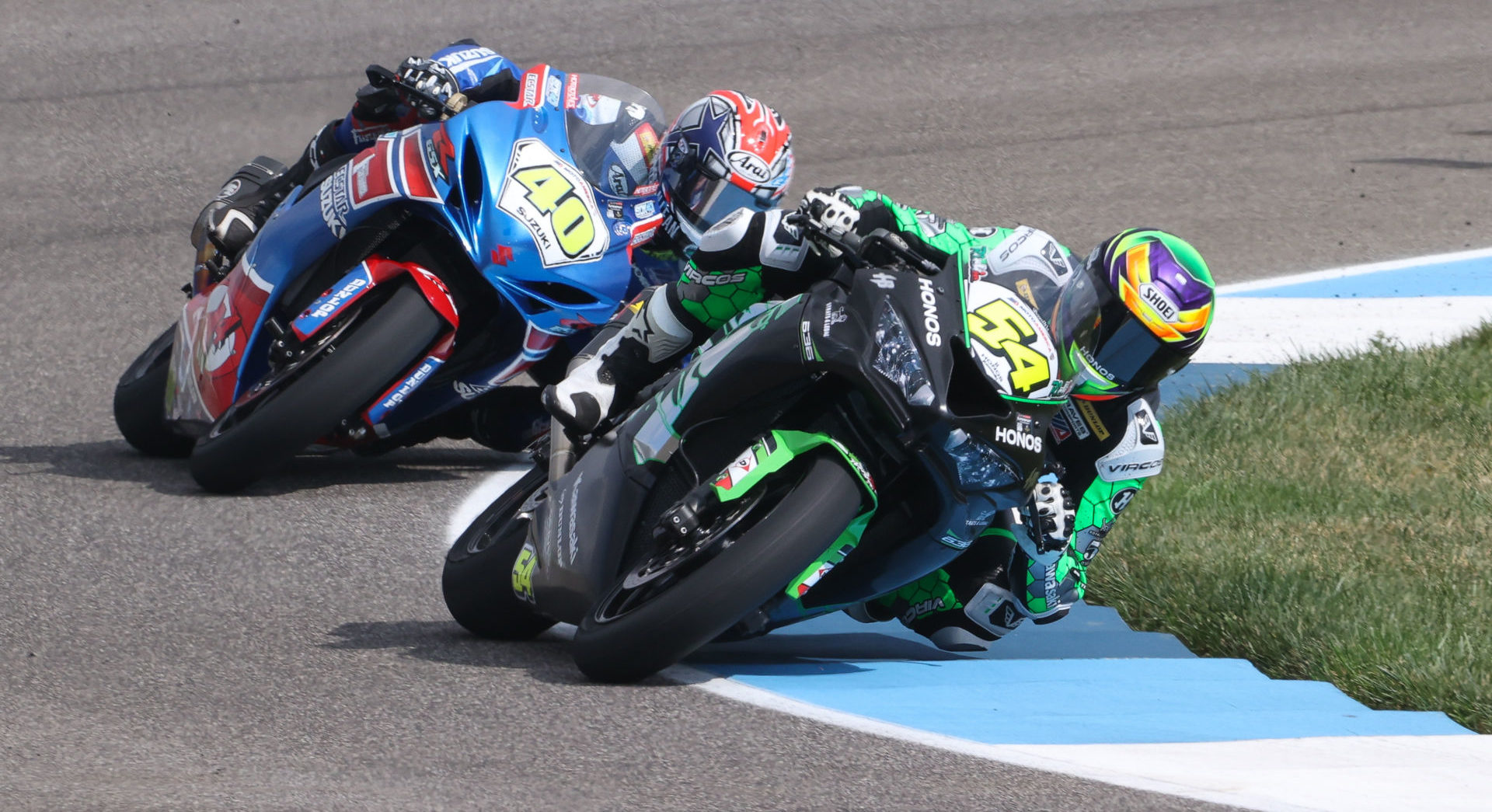 It's been like this all year in Supersport: Richie Escalante (54) vs. Sean Dylan Kelly (40). We can expect more or the same at WeatherTech Raceway Laguna Seca this coming weekend. Photo by Brian J. Nelson, courtesy MotoAmerica.