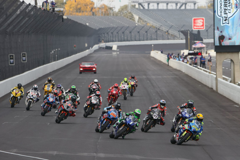 The second and final restart of MotoAmerica Superbike Race One with Toni Elias (24) leading Cameron Beaubier (1), Jake Gagne (32), Lorenzo Zanetti (87), Bobby Fong (50), Josh Herrin (2) and the rest of the field into Turn One. Photo by Brian J. Nelson.