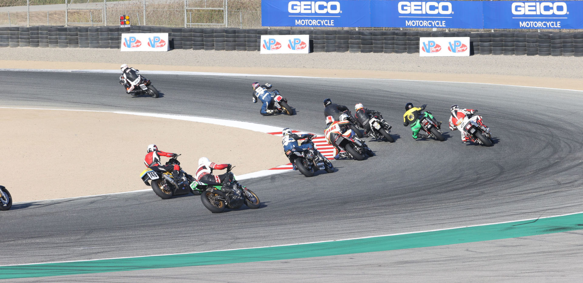 The MotoAmerica Heritage Cup/CSRA field carves through Turn Two at WeatherTech Raceway Laguna Seca. Photo by Brian J. Nelson, courtesy CSRA.