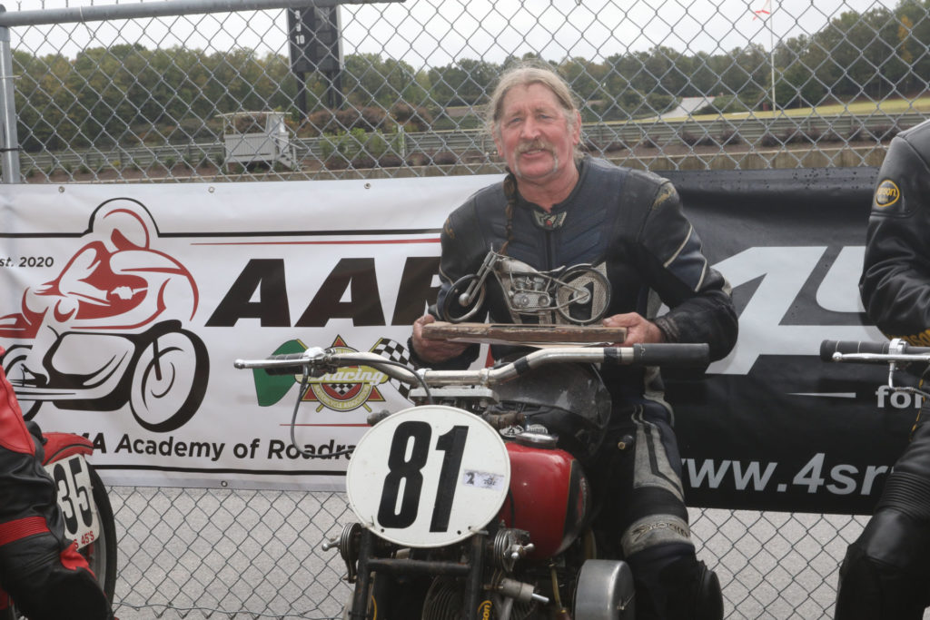 Ralph Wessell with his first-place trophy for winning the AHRMA Handshift Shootout. Photo by etechphoto.com, courtesy AHRMA.