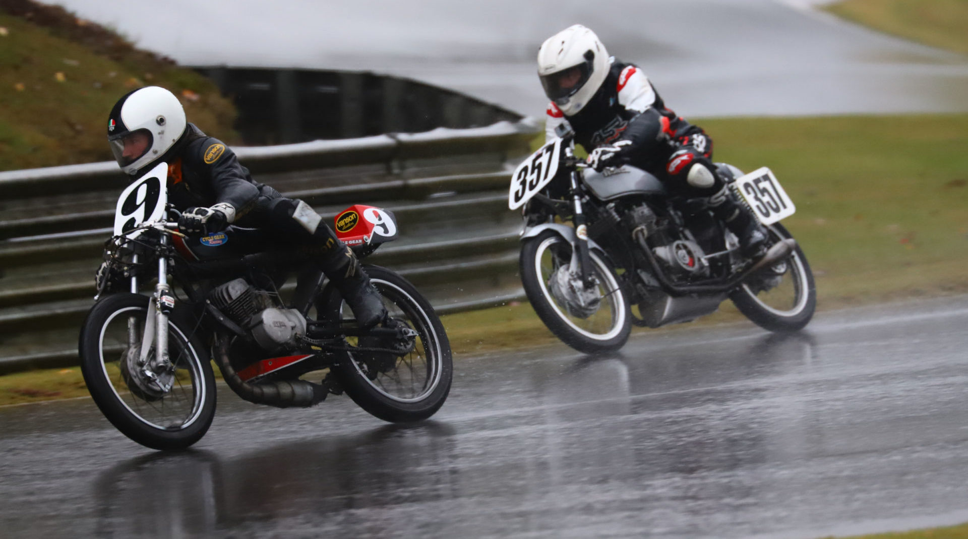 AHRMA racers Colton Roberts (9) and Joe Koury (357) at speed in the wet at Barber Motorsports Park. Photo by etechphoto.com, courtesy AHRMA.