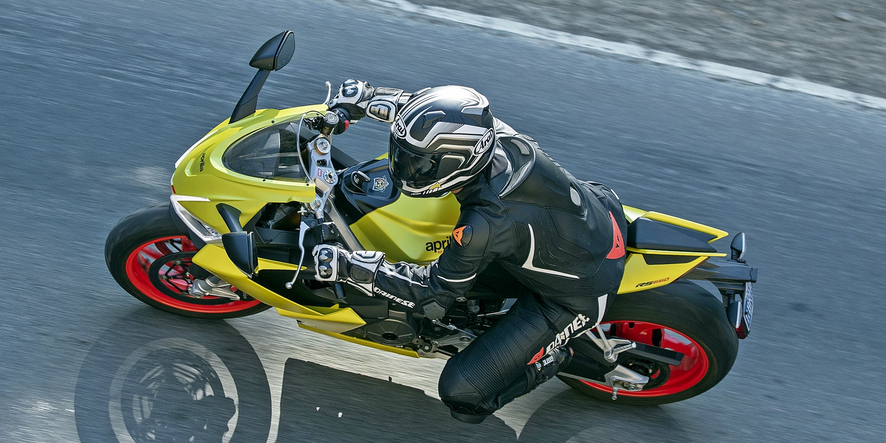 The light, narrow, stiff chassis is easy to flick from side to side, and the torquey powerband and spot-on mapping makes getting on the throttle and driving out of the corners easy and precise. Photo by Kevin Wing, courtesy of Aprilia.