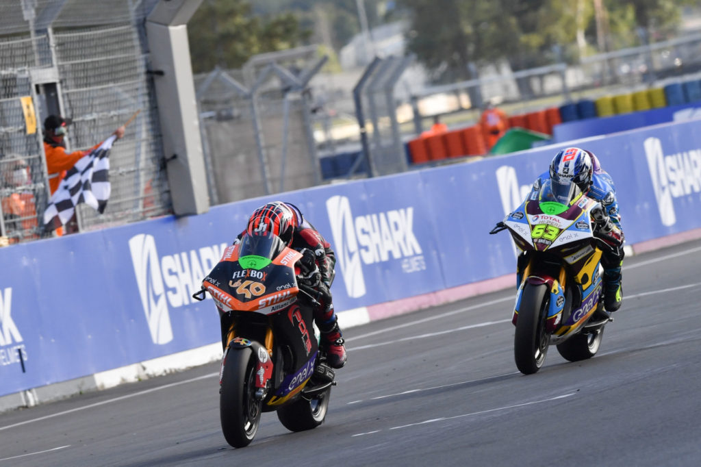 Jordi Torres (40) leading Mike Di Meglio (63) in MotoE World Cup Race One at Le Mans. Photo courtesy Dorna.