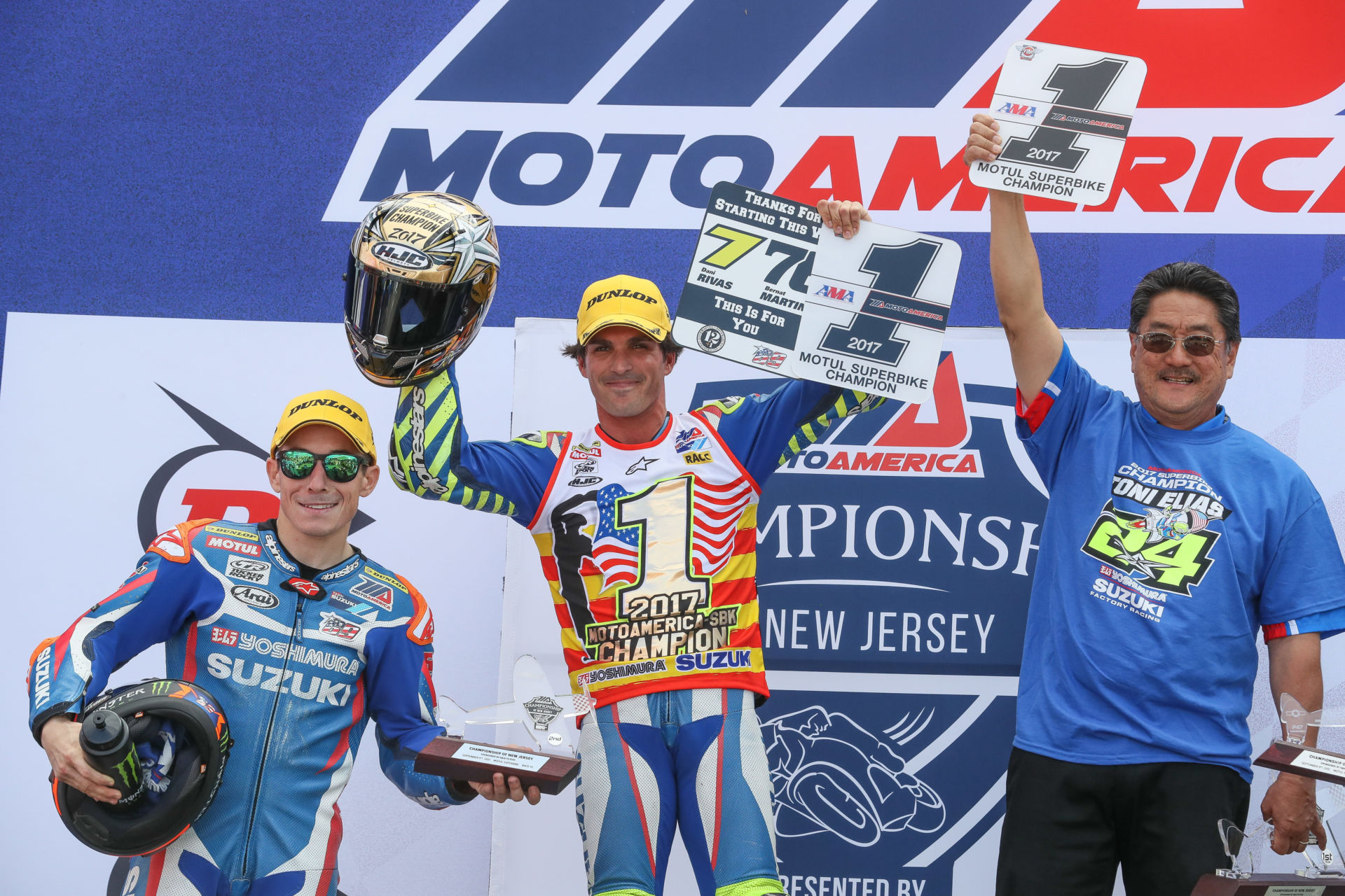 Toni Elias (center) celebrates his 2017 Superbike Championship with teammate Roger Hayden (left) and Don Sakakura from Yoshimura (right). Photo courtesy Suzuki Motor of America, Inc.