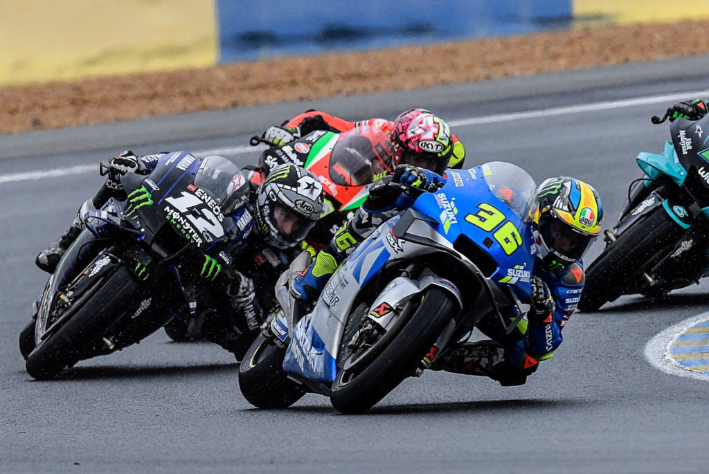 Joan Mir (36) leading Maverick Vinales (12) and Aleix Espargaro (41). Photo courtesy Repsol Honda.