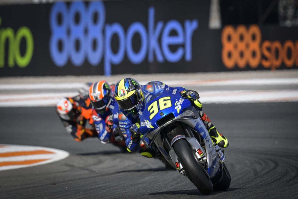 Joan Mir (36) leads Alex Rins (42) and Pol Espargaro (44) at Valencia #1. Photo courtesy Dorna.