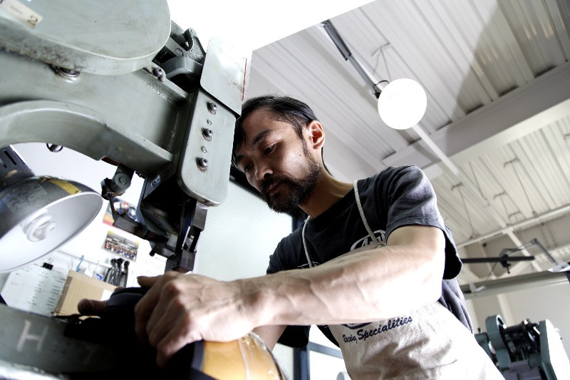 A worker at Arai's factory in Japan. Photo courtesy Arai.