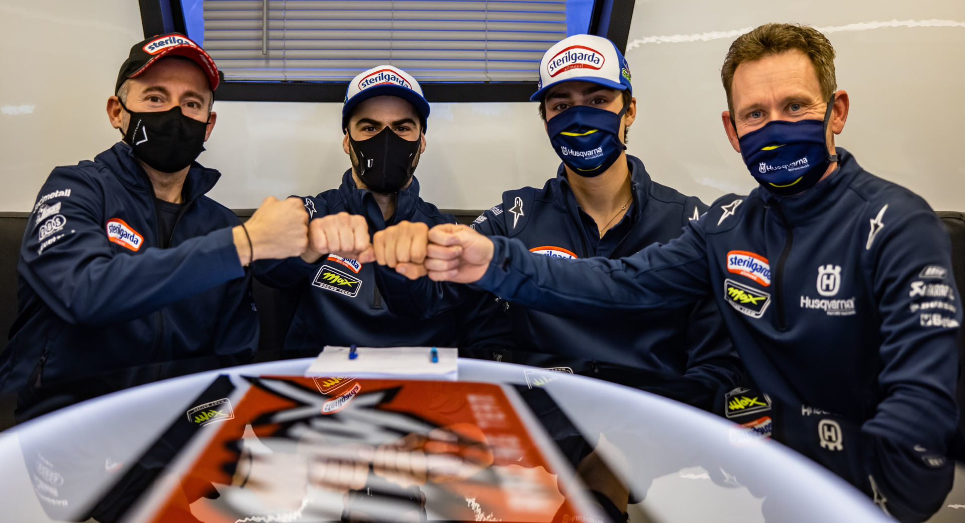 (From left) Sterilgarda Max Racing Team Owner Max Biaggi, Romano Fenati, Alonso Lopez, and Team Manager Peter Oettl. Photo courtesy Husqvarna Motorcycles.