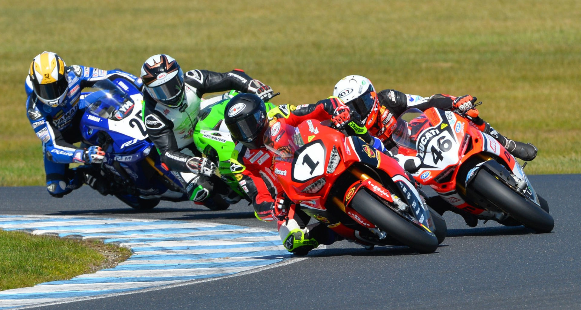Troy Herfoss (1) leads Mike Jones (46), Matt Walters, and Daniel Falzon (25) during an Australian Superbike race at Phillip Island in 2019. Photo by Russell Colvin, courtesy Penrite Honda.