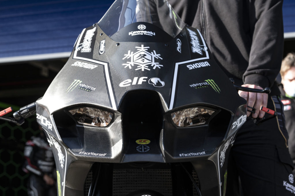 A head-on shot of the new Kawasaki Ninja ZX-10RR Superbike fairing. The headlight decals are separated by a central ram air intake and flanked by ducting to likely aid aerodynamics while combating front-end lift. Photo courtesy Kawasaki.