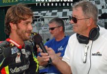 Daytona International Speedway public address announcer and former racer Richard Chambers (right) interviewing former Latin America Superbike Champion and current Sporting Director for the Italtrans Racing Moto2 World Championship team Robertino Pietri (left) at Daytona International Speedway in 2016. Photo by David Swarts.