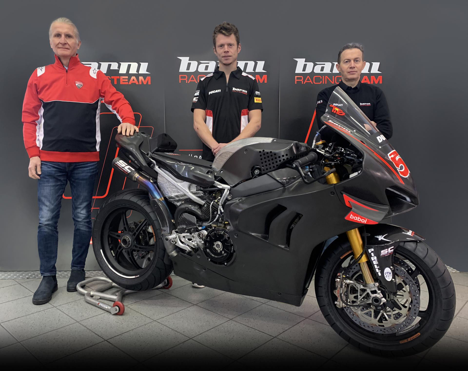 Paolo Ciabatti, Sporting Director Ducati Corse (left), Tito Rabat (center), and Barni Racing Principal Marco Barnabo (right). Photo courtesy Barni Racing.