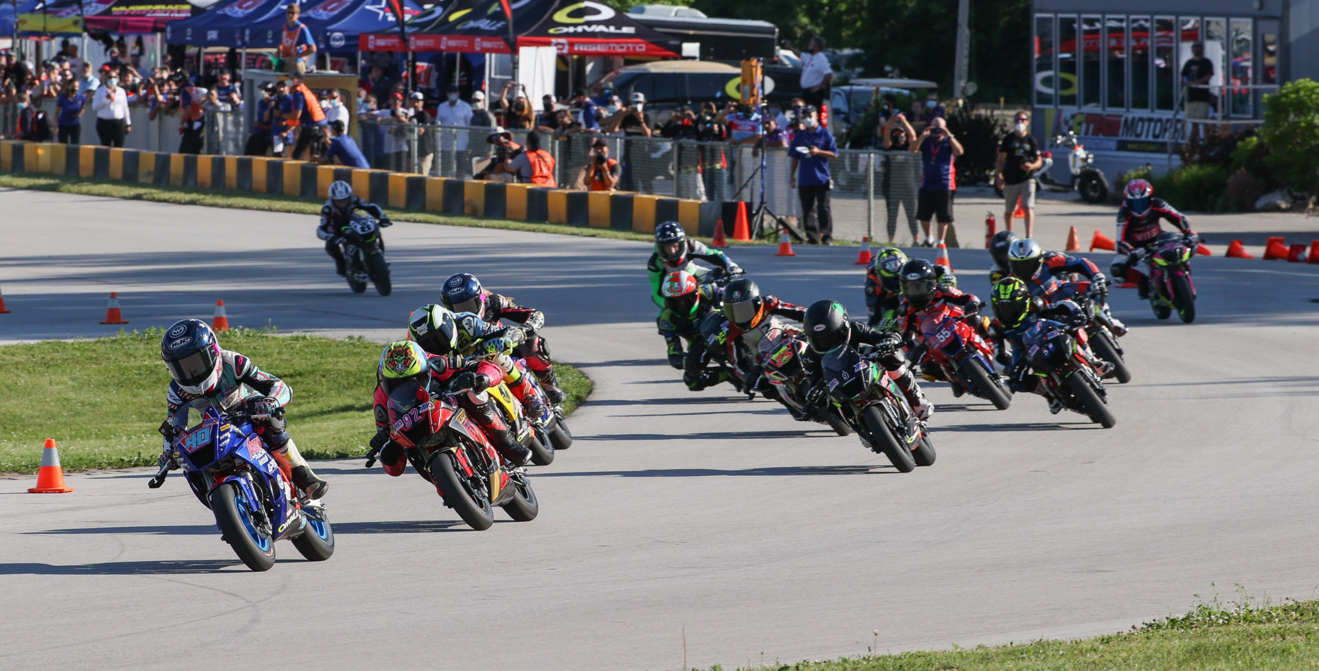 The start of a MotoAmerica Mini Cup by Motul race, featuring Ohvale spec motorcycles, at Road America in 2020. Photo by Brian J. Nelson.