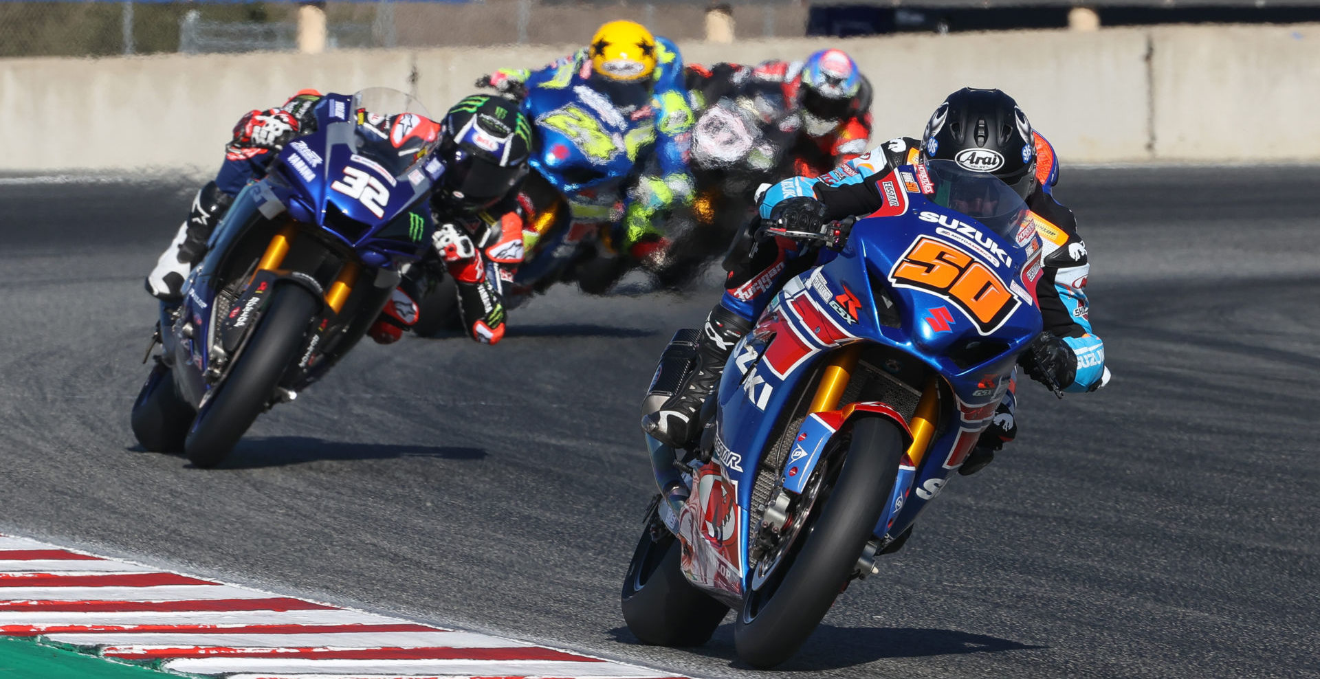 Bobby Fong (50) leads Jake Gagne (32), Toni Elias (24), and Lorenzo Zanetti (87) during MotoAmerica Superbike Race Three at WeatherTech Raceway Laguna Seca in 2020. Photo by Brian J. Nelson.