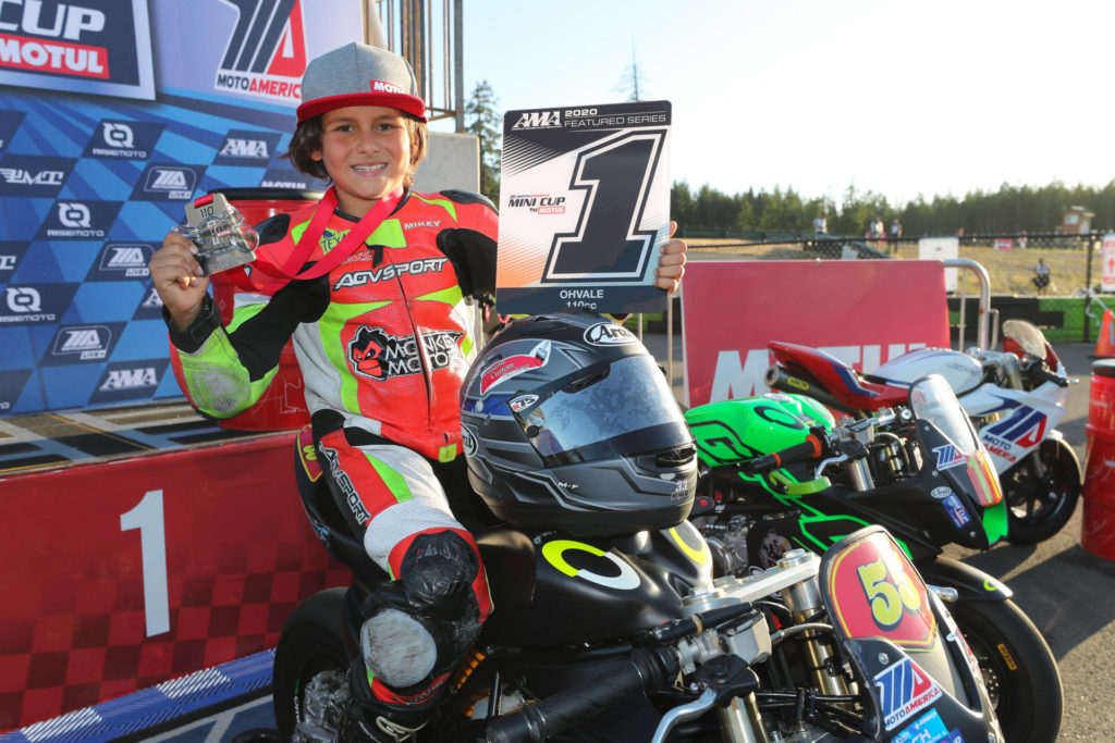 Mikey Lou Sanchez with one of his MotoAmerica Mini Cup #1 plates. Photo by Brian J. Nelson.