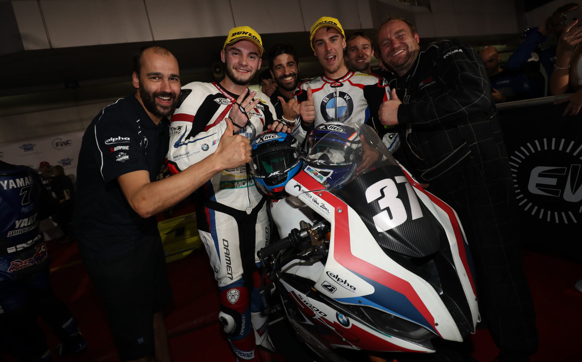 Ilya Mikhalchik (second from left), Markus Reiterberger (third from right), and members of the BMW Motorrad Endurance World Championship team in 2020. Photo courtesy BMW Motorrad Motorsport.