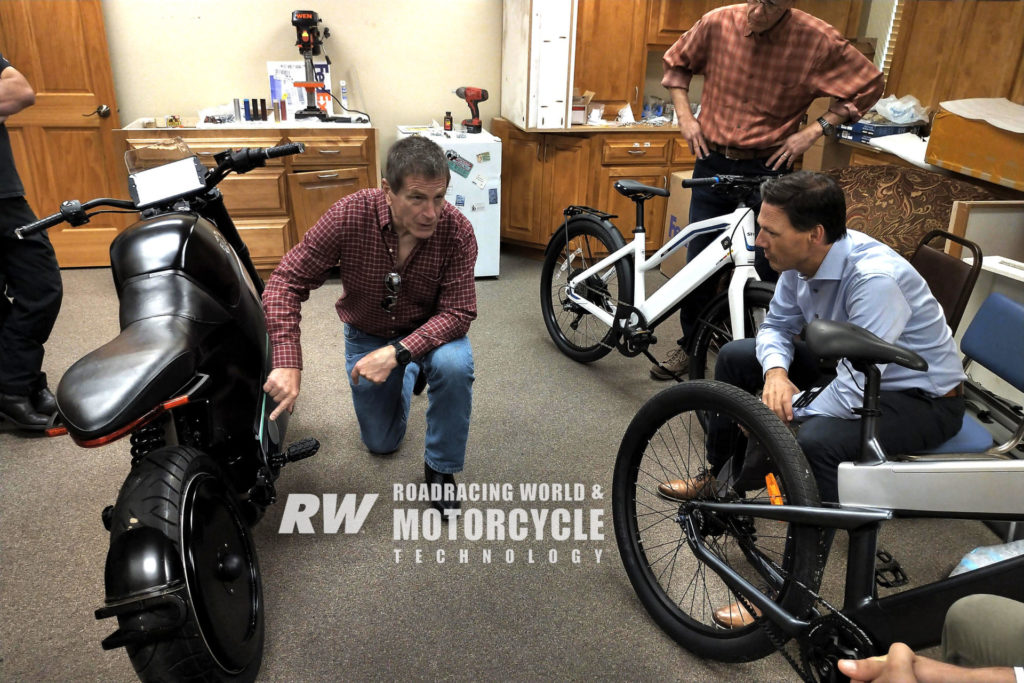 Erik Buell (center, kneeling) discussing a FUELL Flow electric motorcycle with FUELL engineers. Photo courtesy FUELL.