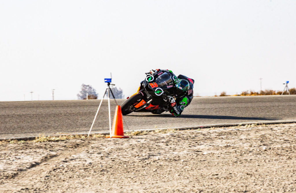 Josh Herrin (2) dragging his elbow as he approaches an electronic timing instrument at Buttonwillow Raceway Park. Photo courtesy Fresh n' Lean.