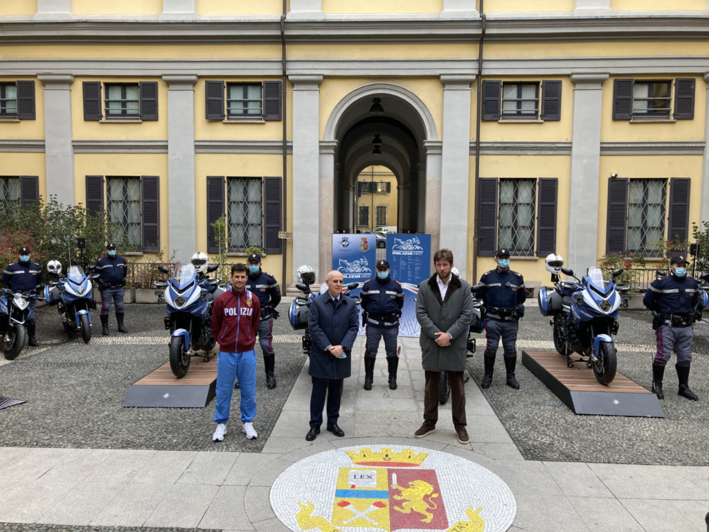 (From left) MV Agusta Moto2 racer Simone Corsi, Milan Police Commissioner Giuseppe Petronzi, and MV Agusta CEO Timur Sardarov at police headquarters in Milan, Italy. Photo courtesy MV Agusta.