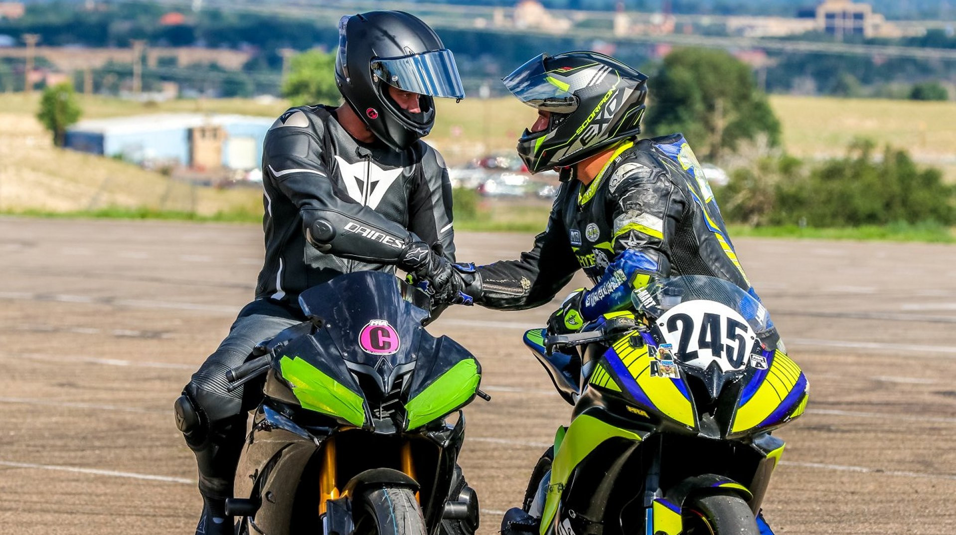 MRA instructor Jason Martinez (245) congratulates a new MRA racer. Photo by Brandon Wren Photography, courtesy MRA.