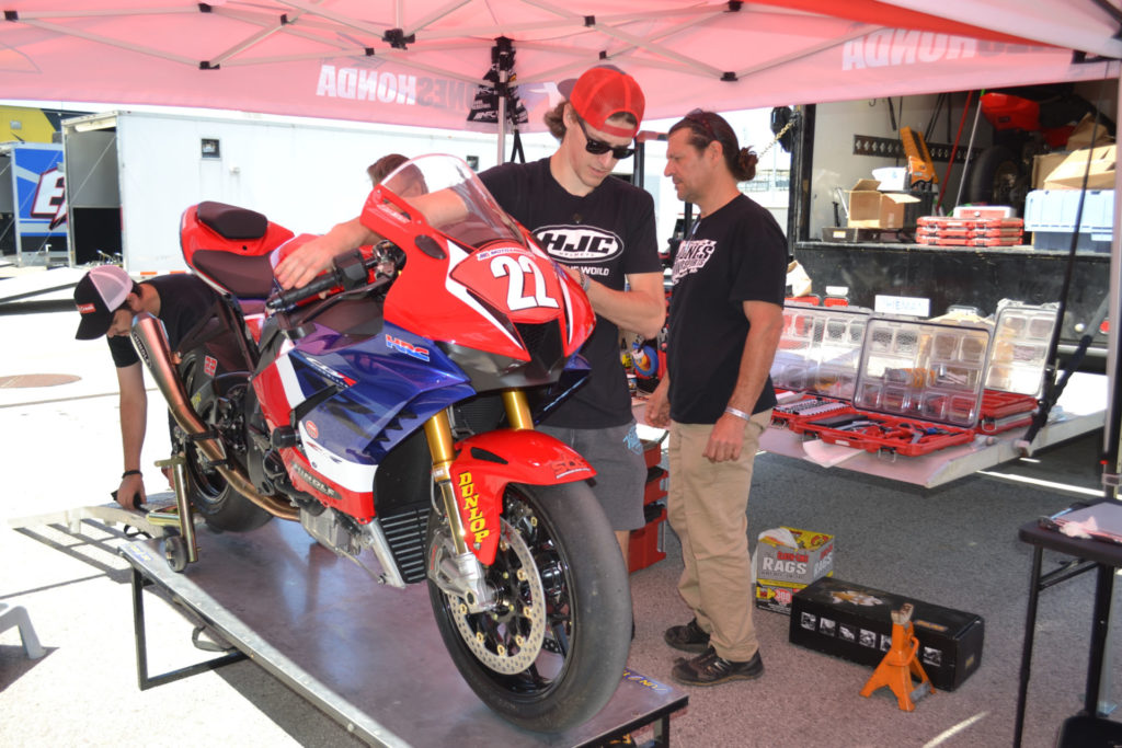 Ashton Yates puts his new Jones Honda CBR1000RR-R Fireblade SP on a work bench. His father, former AMA Pro Superbike racer Aaron Yates, can be seen in the background. Photo by David Swarts.