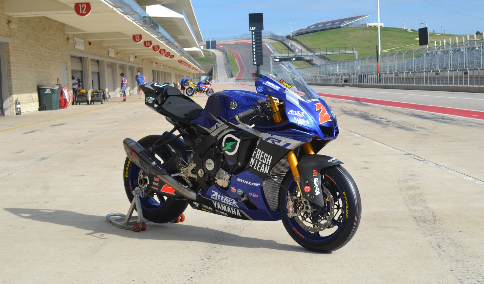 Josh Herrin's Fresh N' Lean Attack Performance Yamaha YZF-R1 positioned on pit lane at COTA for promotional photos. Photo by David Swarts.