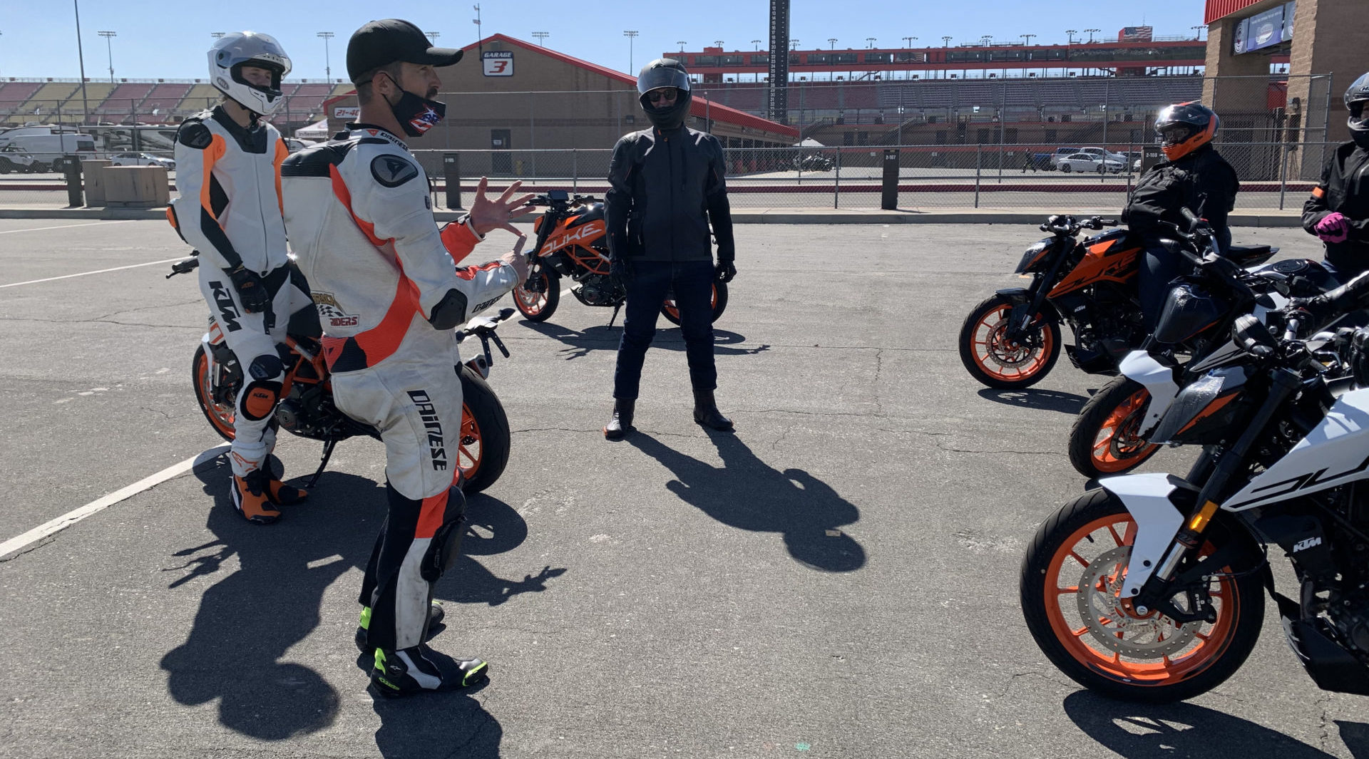 Coaches with riders on KTM motorcycles. Photo courtesy USMCA.